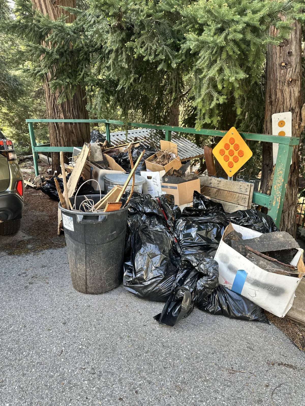 Curbside junk pile before pickup — San Bernardino Mountains